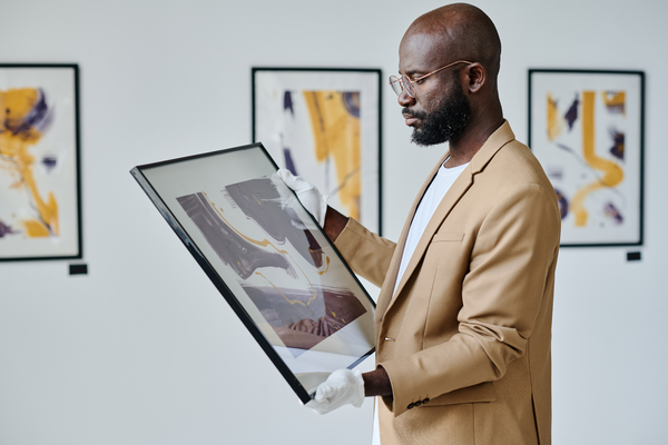Man looking at artwork Man looking at artwork